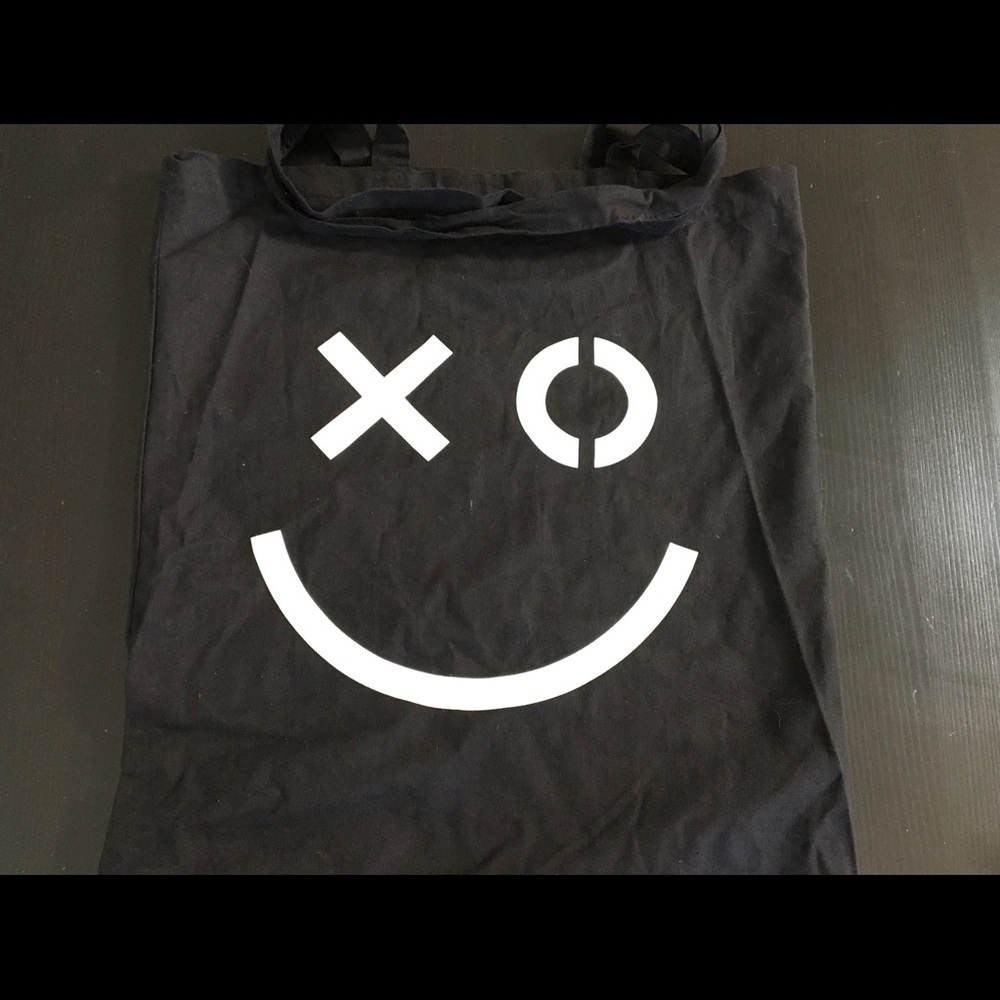 Smiley face tote bag books groceries